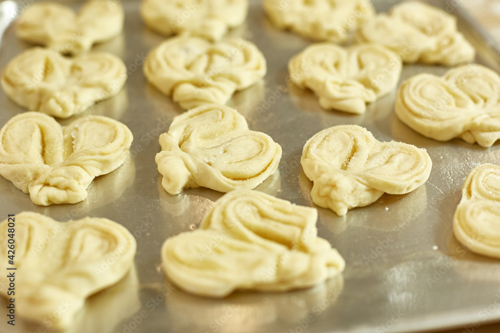 housewife makes sweet dough buns, selective focus housewife makes sweet dough buns, selective focus
