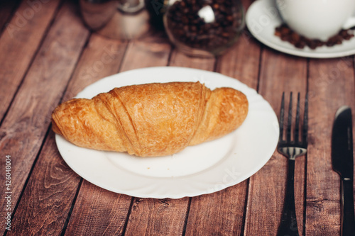 croissant in a plate on the table kitchenware breakfast meal 