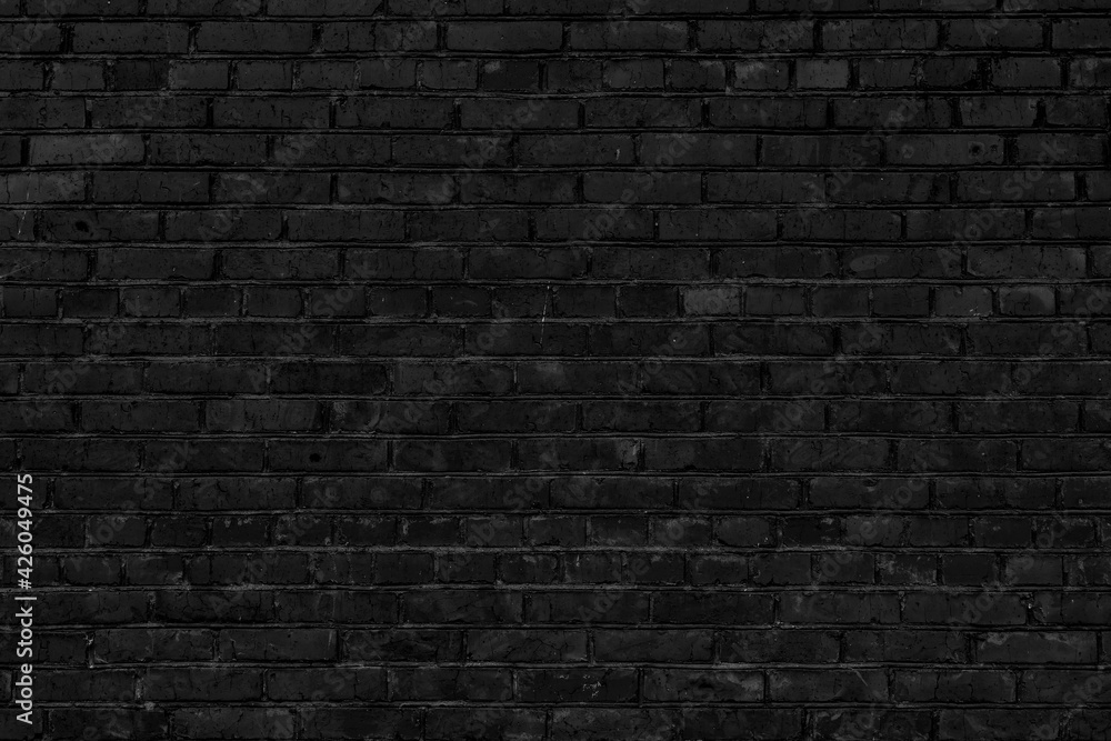 Black brick building wall. Interior of a modern loft. Background for design