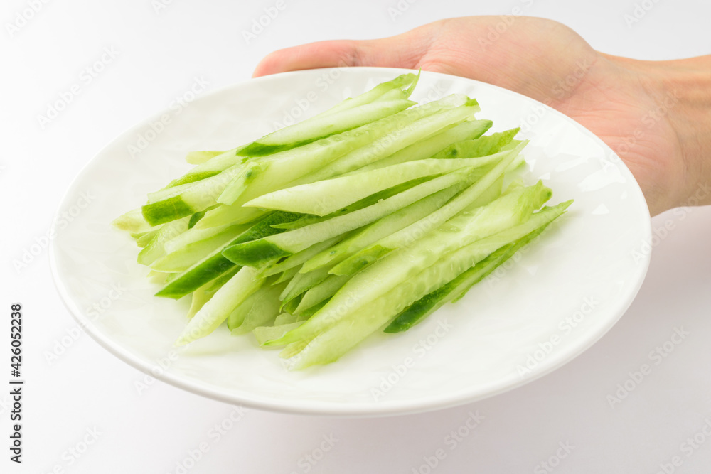 Sliced cucumber on white background Sliced cucumber on white background