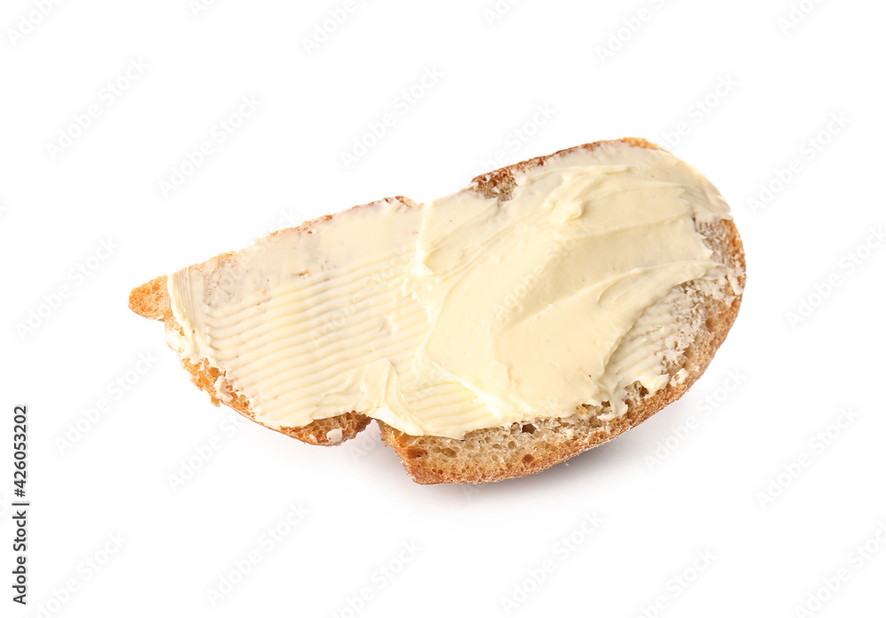 Slice of fresh bread with butter on white background Slice of fresh bread with butter on white background