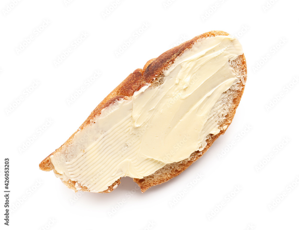 Slice of bread with butter on white background Slice of bread with butter on white background
