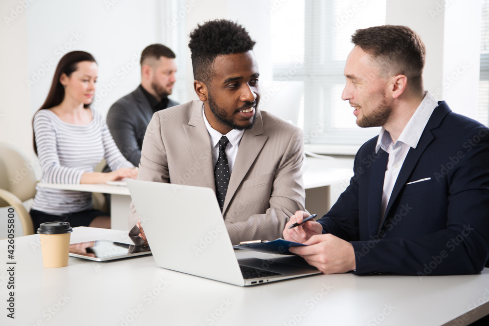 Business people working together in the office Business people working together in the office
