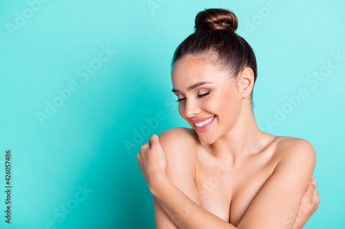Photography Portrait of attractive cheerful trendy girl hugging herself pure freshness copy