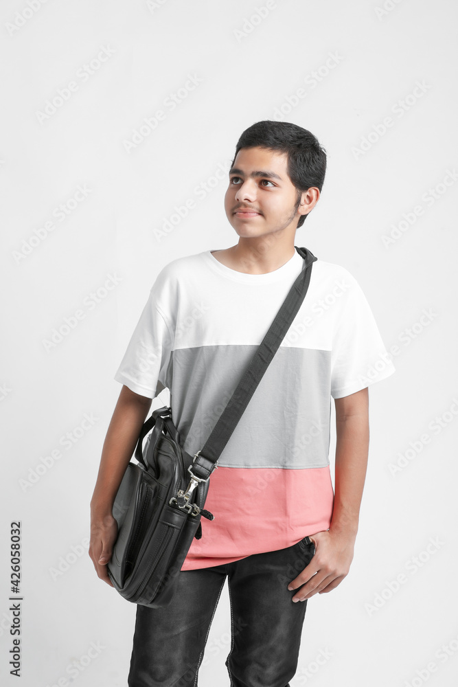 College Boy holding with file in hand on white background. College Boy holding with file in hand on white background.