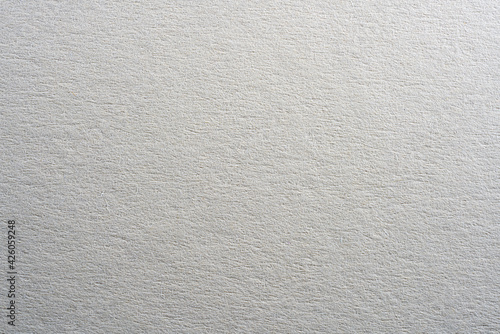 Colored paper with strong structure as a background, photographed in the studio