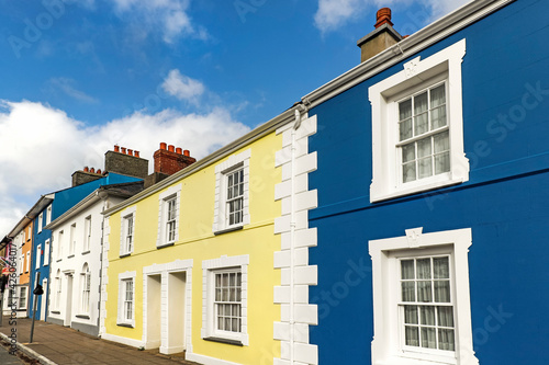 Some of the many colourful regency style houses by the harbour in this popular coastal town, Aberaeron, Ceredigion, Wales, United Kingdom photo