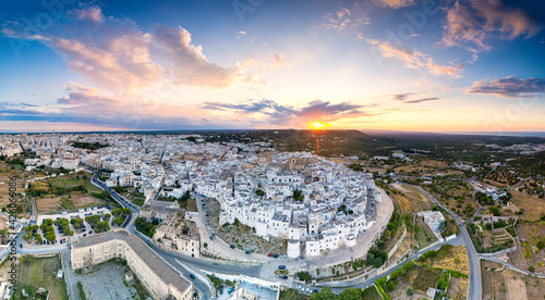 Aerial panoramic of Ostuni at sunset, province of Brindisi, Salento, Apulia, Italy