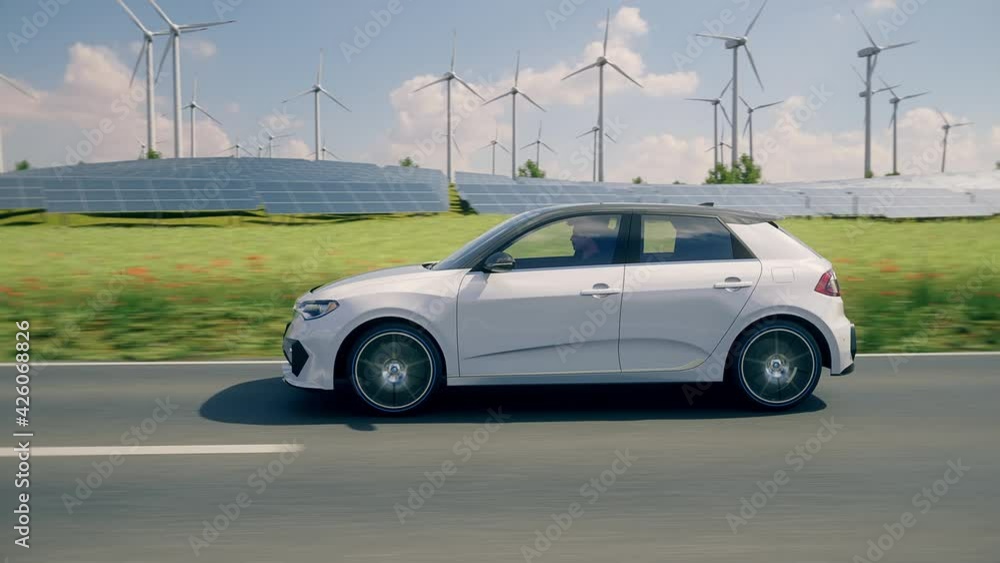 Generic autonomous electric car driving through a vibrant green landscape with solar panels and wind turbines in background. Green energy concept. Realistic high quality 3d animation. 