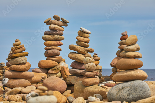 Stone trolls piled up on the shore at Lindisfarne, Holy Island, Northumberland, northeast England, United Kingdom