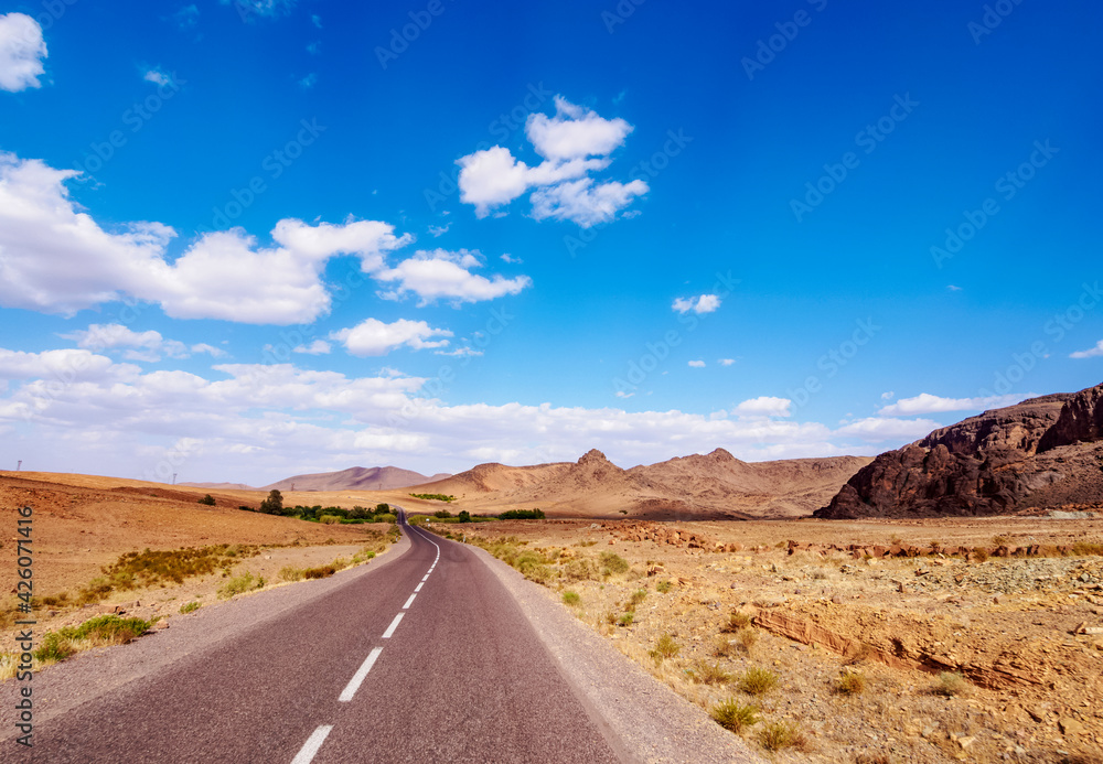 Desert Road in Draa-Tafilalet Region, Morocco, North Africa Desert Road in Draa-Tafilalet Region, Morocco, North Africa