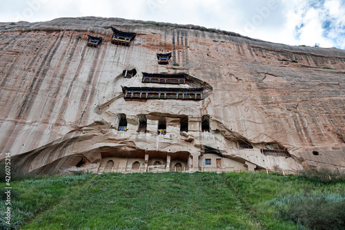 Front view of a temple hollowed in the mountain, Ganzu, China