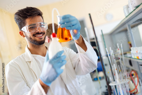 Young scientist student man working at the laboratory