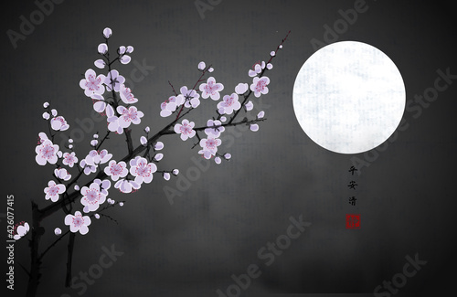 Blossoming branch of oriental cherry and the moon in dark night sky. Traditional oriental ink painting sumi-e, u-sin, go-hua. Sakura plum blossom. Hieroglyphs - peace, tranquility, clarity, silence