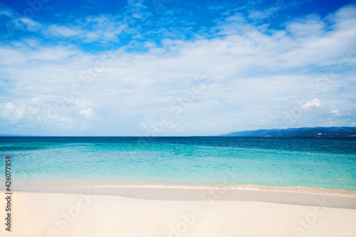 Landscape of Carrebean see with Turqouise water and white sand beach.Tropcal vacation. Travel destination. Dominican republic.