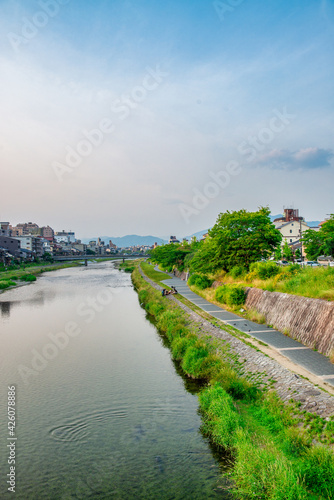 Kyoto river and skyline on a cloudy afternoon © jovannig