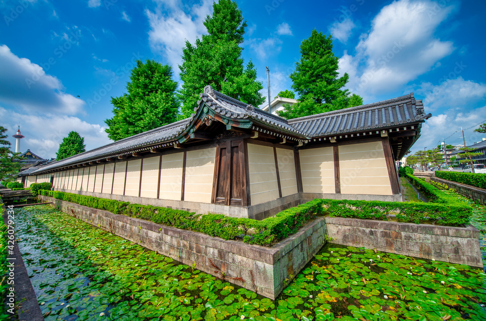 Beautiful Shrine of Kyoto with City Tower on the background, Japan