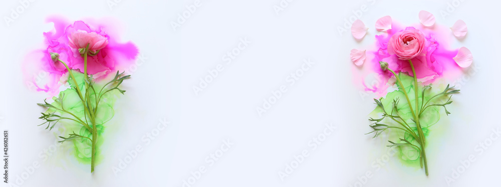 Obraz premium Creative image of Buttercup flower on artistic ink background. Top view with copy space