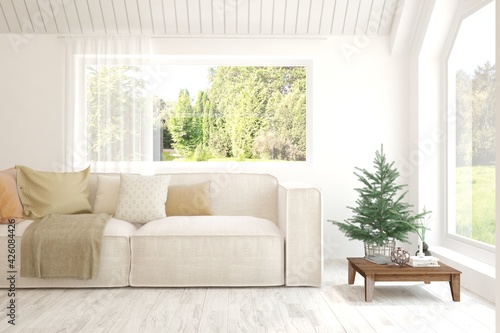 White living room with sofa and summer landscape in window. Scandinavian interior design. 3D illustration