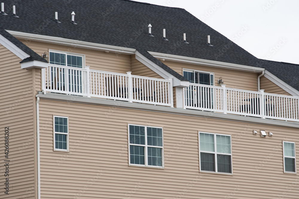 white balcony of a new house fasade plywood building white balcony of a new house fasade plywood building