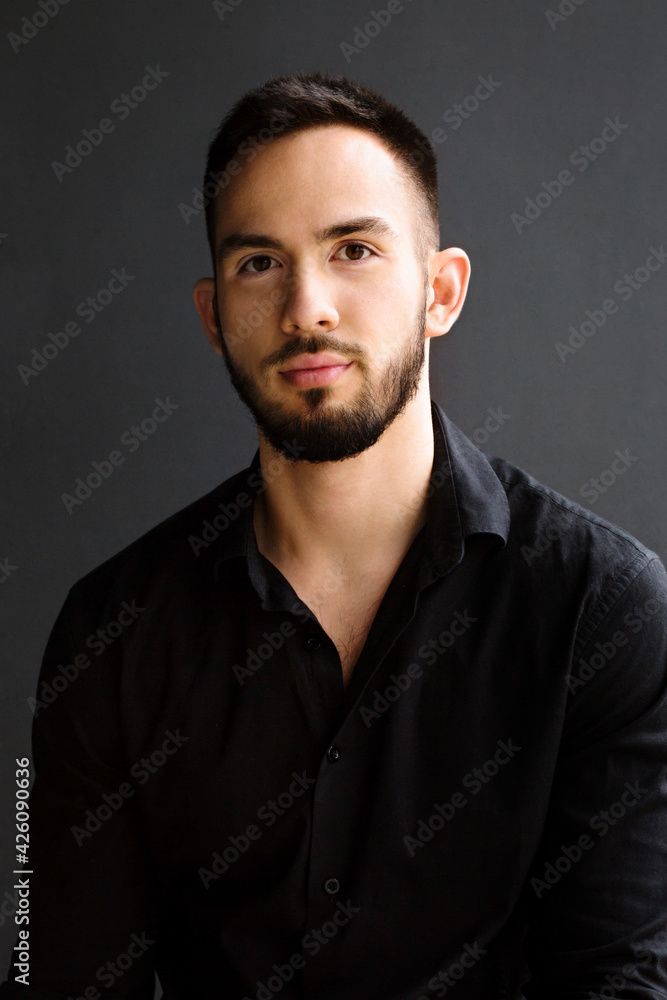 business portrait of a guy in a black shirt