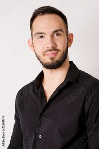 Young friendly man in black shirt