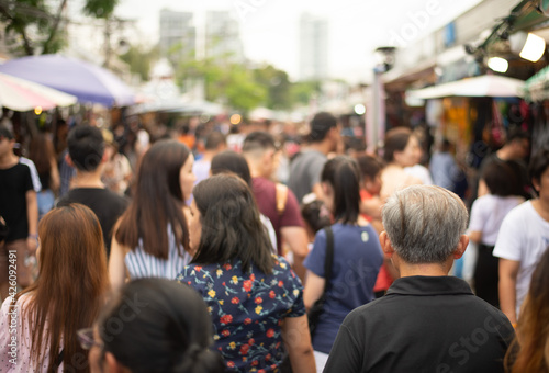 The crowd of anonymous people walking and shopping at the weekend market at Jatujak market Bangkok Thailand. Jatujak the most destination for tourist around the world.