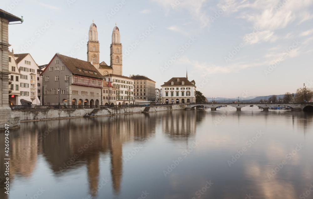 Zurich city center by the river with reflections