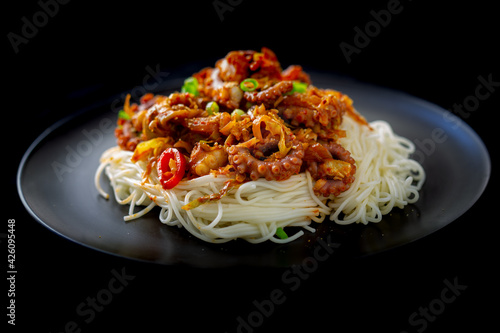 Spicy Squid Stir Fry which is called Ojingeo Bokkeum with thin white noodle