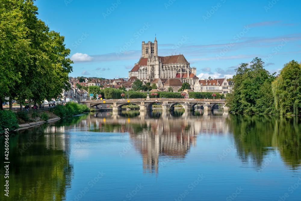 The Yonne river and the church of Auxerre in Burgundy, France