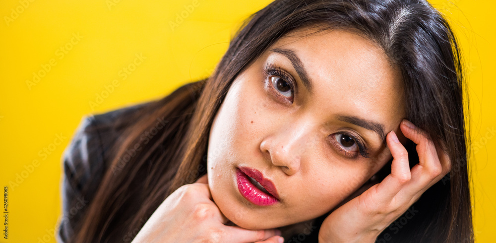 Fototapeta premium Young beautiful woman close-up - headshot in a studio - studio photography
