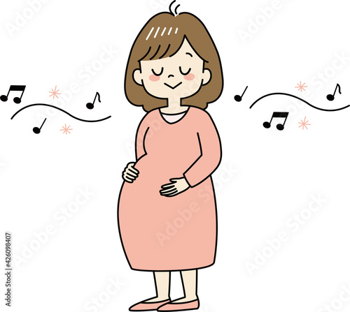 音楽を聴いてリラックスする妊婦さん（全身）