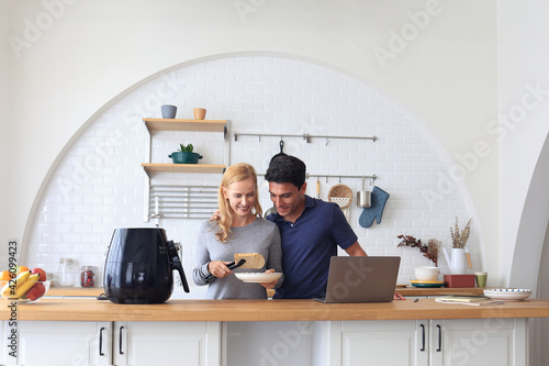 Konstfotografi The Caucasian family Make breakfast with the air fryer together