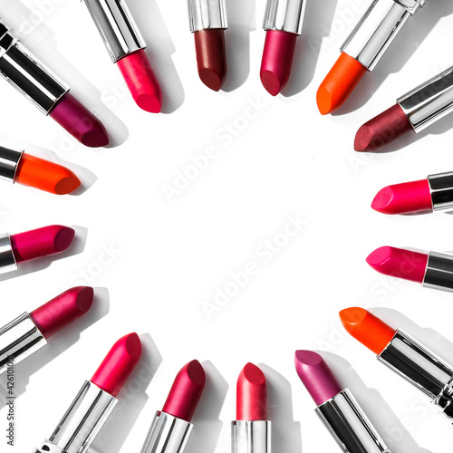 Multicolored lipstick on a white background