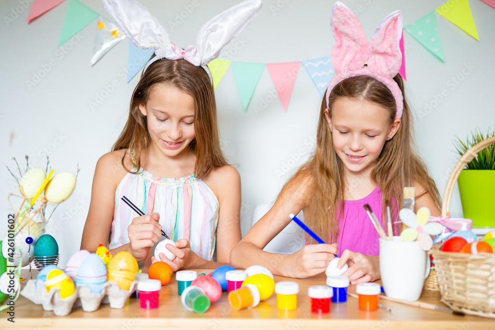 Happy easter. Beautiful little kids wearing bunny ears on Easter day. Happy easter. Beautiful little kids wearing bunny ears on Easter day.