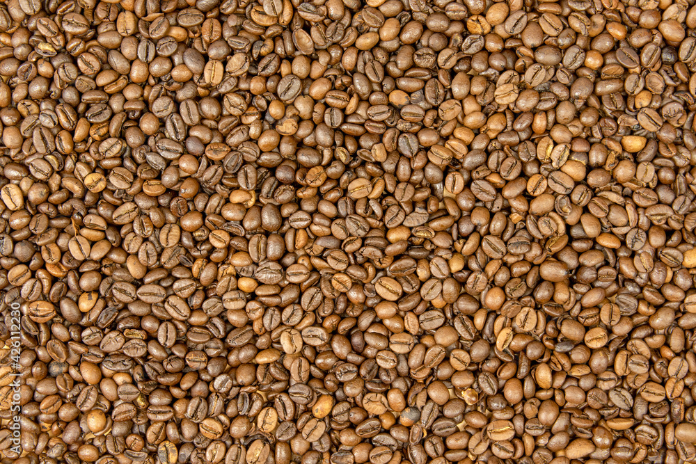 Background from freshly roasted coffee beans. Background from freshly roasted coffee beans.