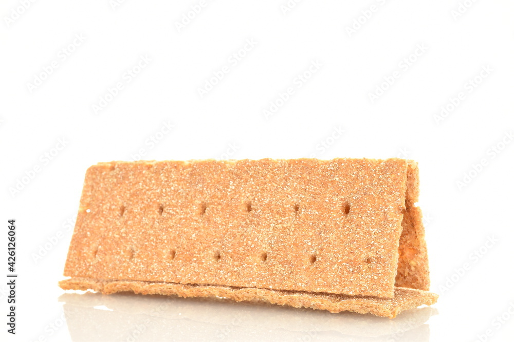 Several multigrain thin crisps, close-up, isolated on white. Several multigrain thin crisps, close-up, isolated on white.