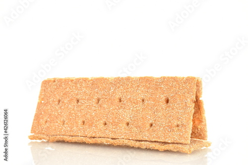 Fotografie Several multigrain thin crisps, close-up, isolated on white.