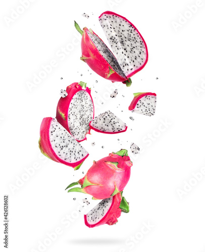 Cuadro en lienzo Sliced ripe dragon fruits (pitahaya) in the air on a white background