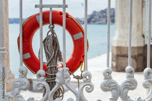 Fotografie A lifebuoy on the gate at Dolmabahce Park in Istanbul