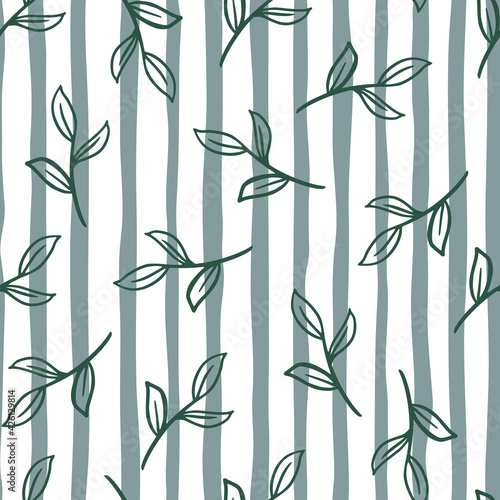 Fototapeta Naklejka Na Ścianę i Meble -  Seamless random botanic pattern with simple style leaves branches print. Striped white and blue backround.