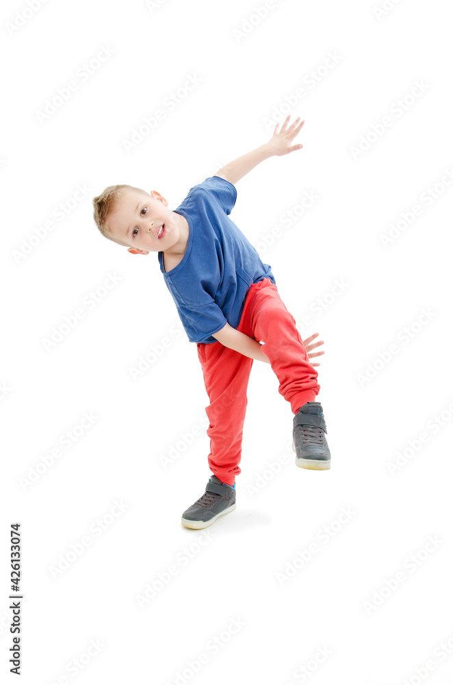Little cool hip-hop boy in dance. Isolated on white background
Little cool hip-hop boy in dance. Isolated on white background