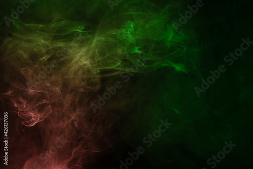 Green and pink steam on a black background.