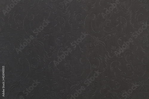 Fondo textura de tela oscura con trama bordado y dibujos