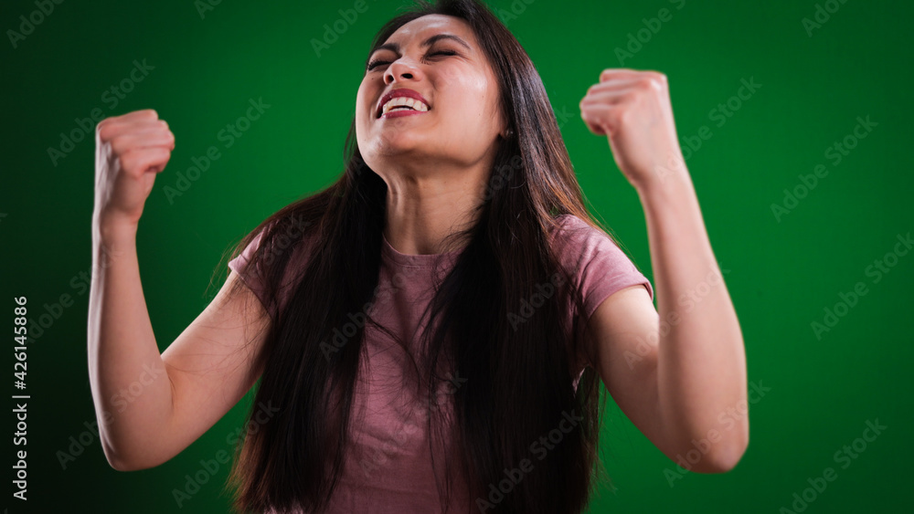 Young woman is happy like crazy - studio photography Young woman is happy like crazy - studio photography