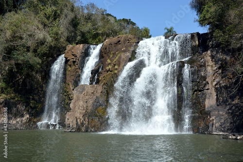 Waterfall with great flow of water.