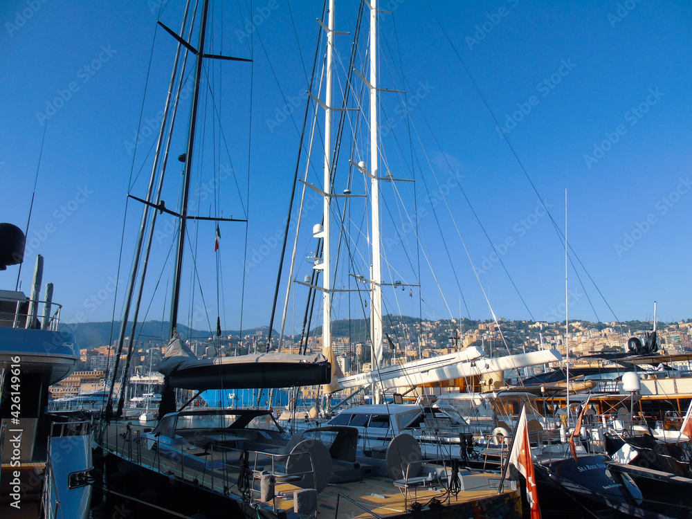 Genoa, Italy- April 01, 2021: Panoramic view of the waterfront and the old italian sea port in Genova by spring with blue sky and clear water.