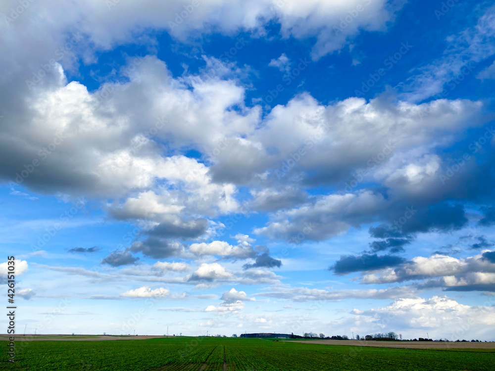 Clouds over field Clouds over field