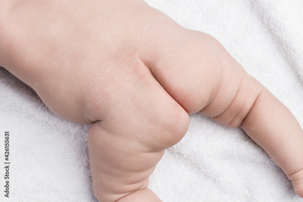 Hygiene of newborns. Mom washes the baby with a wet napkin the baby's body. Hygiene of newborns. Mom washes the baby with a wet napkin the baby's body.