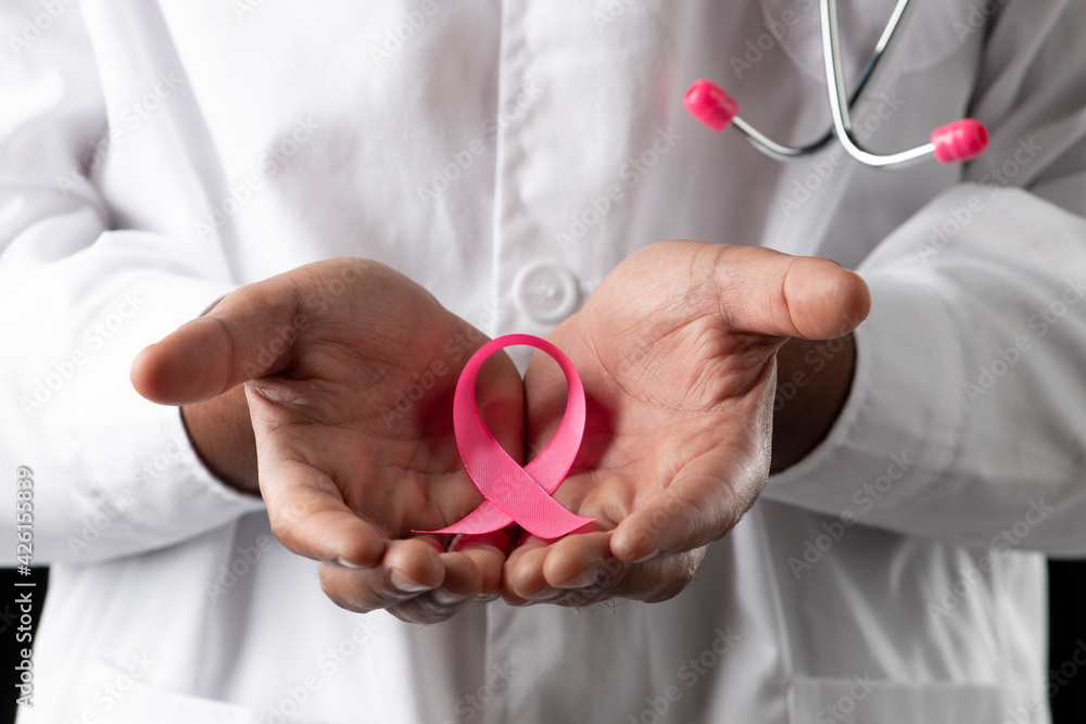 dark skin doctor with pink stethoscope dark skin doctor with pink stethoscope
